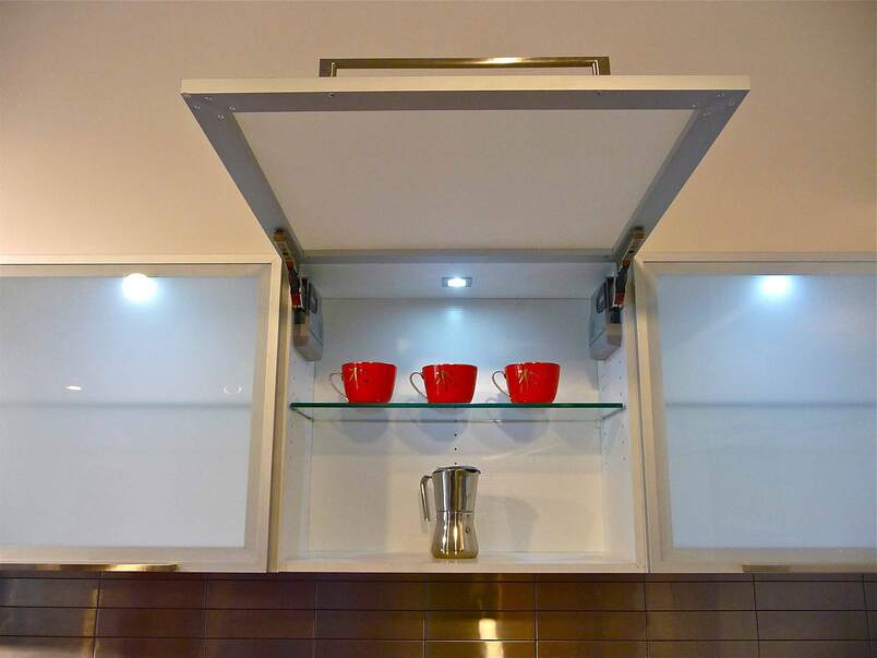 servo drive automatic fitting by blum installed by design indian kitchen company gurgaon and delhi